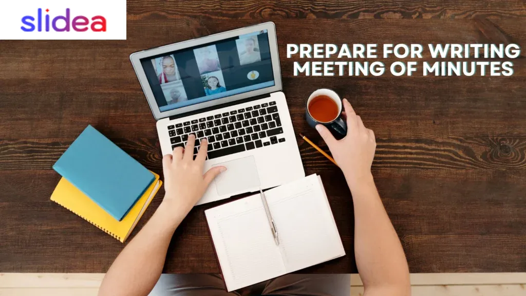 Top view of a person attending a virtual meeting with notebook, pen, and tea, preparing to write meeting minutes.